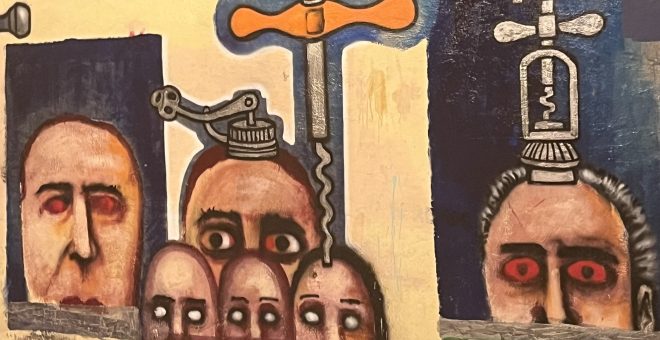 A street mural in the Cabanal area, Valencia large male faces some with bloodshot, some wide-open eyes stare from the walls there’s a dagger in the mix and what looks like a religious vessel on one of the heads